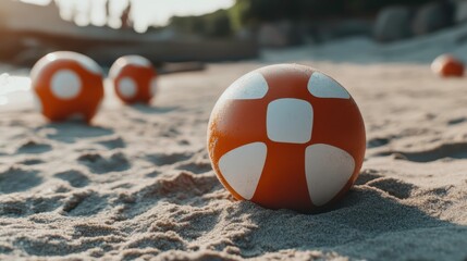 Obraz premium Beach fun with lifebuoys coastal sand outdoor activity vibrant sunlight close-up view safety concept
