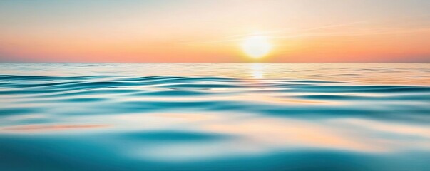 Obraz premium Waves abstract background idea. Beautiful sunset over serene ocean waters, reflecting vibrant hues of orange and blue.