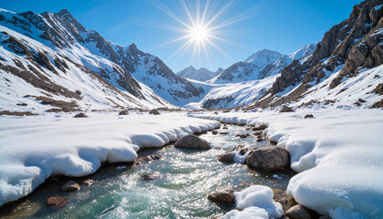 Obraz premium Snowy mountain landscape with stream under bright sunlight