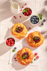 Traditional and healthy berries yeast cake with crumble and fruits.