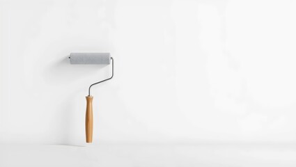 Roller Paint Brush Near White Wall: Calm and Beautiful Interior Painting for Business and Home Renovation