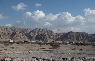 Jebel Jais, the UAE's tallest peak, offers breathtaking views, thrilling ziplines, and cool weather. A serene retreat for adventurers and nature lovers with stunning sunsets.