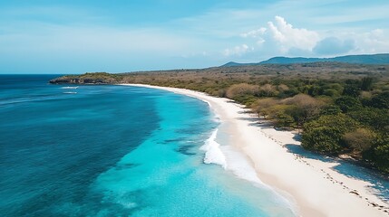 1. A pristine white sandy beach with gentle waves of crystal-clear blue sea stretching to the horizon