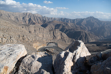 Jebel Jais, the UAE's tallest peak, offers breathtaking views, thrilling ziplines, and cool weather. A serene retreat for adventurers and nature lovers with stunning sunsets.