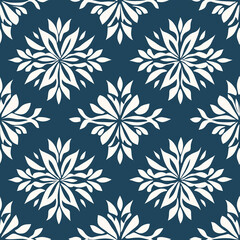 Floral pattern in white on a deep blue background, featuring symmetrical designs that evoke elegance and style.