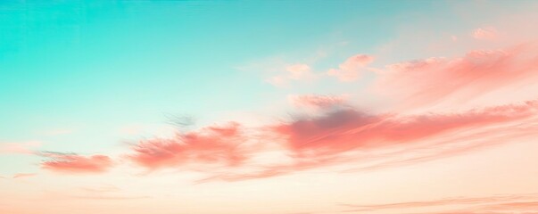 Minimal skies idea. A serene sky displaying soft pastel colors of pink and blue at dusk.