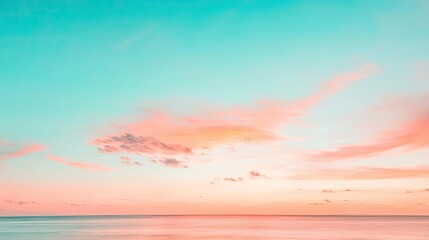 Minimal skies concept. A serene sunset over calm waters with vibrant pink and blue hues illuminating the sky.