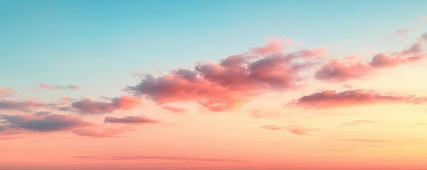 Fototapeta premium Minimal skies idea. A serene sunset sky filled with soft, colorful clouds and a tranquil atmosphere.