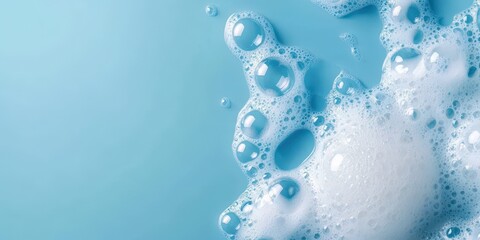 Close-Up View of Soap Foam Bubbles on a Light Blue Background with Soft Textures Ideal for Cleanliness, Freshness, or Hygiene Themes