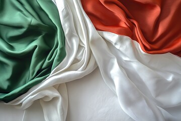 vibrant studio image of traditional italian flag made of fine silk draped softly on clean white surface