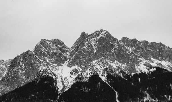 snow covered the Zugspitze mountains in the Alps black and white photography