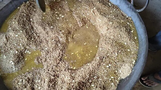 Churma is powdered sweetened cereal  made with bati or baked wheat ball. Famous Rajasthan dish churma mixing it with melted ghee, sugar and dry-fruits. rajasthani food, rajasthani dish.