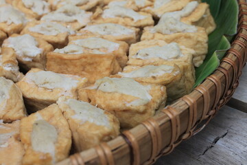Typical Indonesian food called tahu bakso in a container on the table ready to be fried

