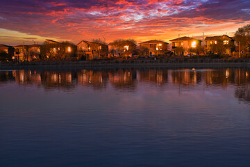 Fototapeta premium Serene Sunset Reflection Over Henderson Community Lake