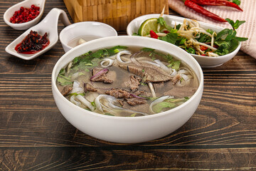 Vietnamese Pho Bo soup with beef and noodles