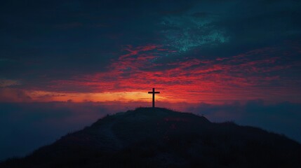 Obraz premium Wooden Cross on a Hilltop Against a Radiant Sunrise with Colorful Sky