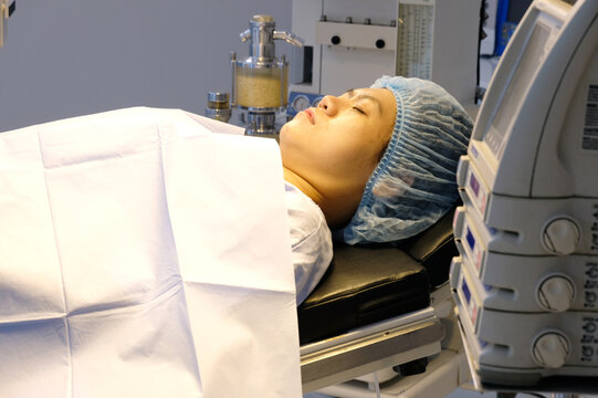 Patients lying in the operating room.