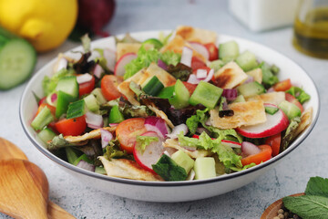 A bowl with Fattoush - Traditional Levantine salad	