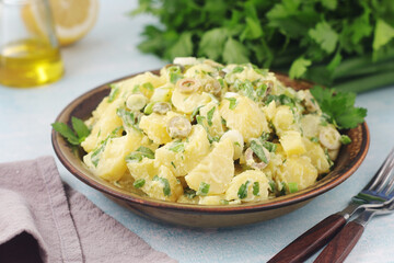 A bowl with Greek potato salads