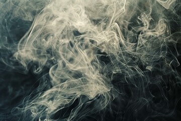 Obraz premium White smoke is swirling on a dark background, creating a moody and mysterious atmosphere