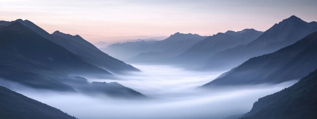 An ethereal shot of a cloud inversion in a mountainous valley at dawn, with fog filling the lower elevations, Cloud inversion scene