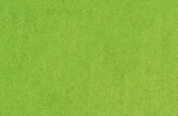 Fototapeta premium Textured green background with a rough relief surface