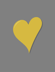 golden heart on a gray background,
