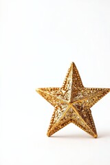Golden star symbol with intricate carvings, isolated on white