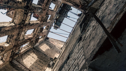 destroyed and burned houses in the city in Ukraine