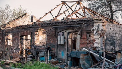 Fototapeta premium destroyed and burned houses in the city in Ukraine