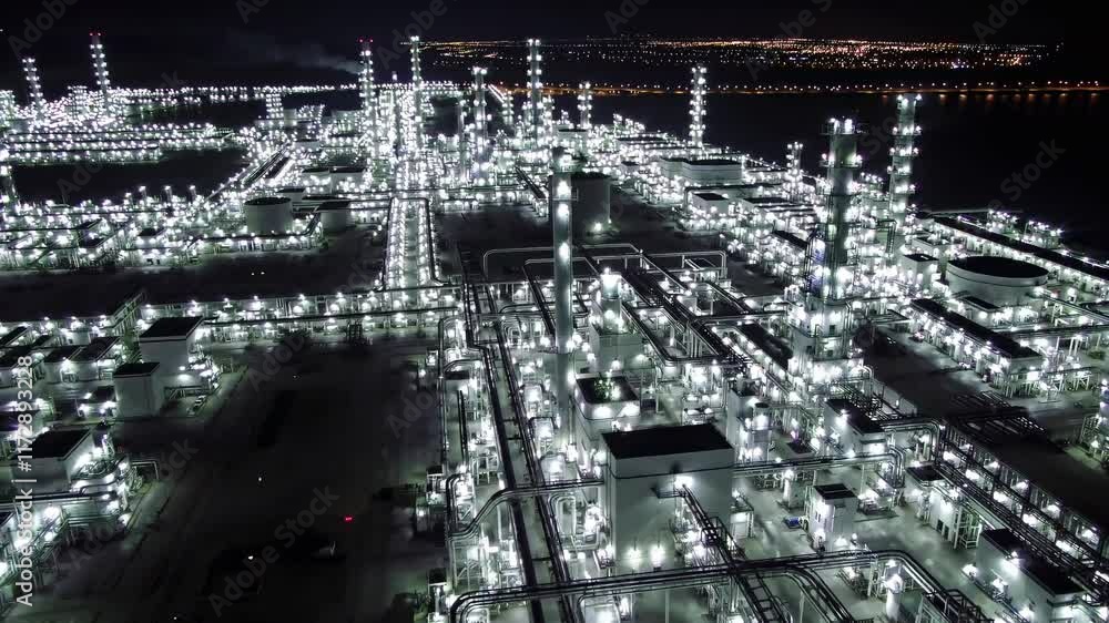 Aufkleber illuminated industrial complex at night showcasing extensive network of pipelines and processing uni