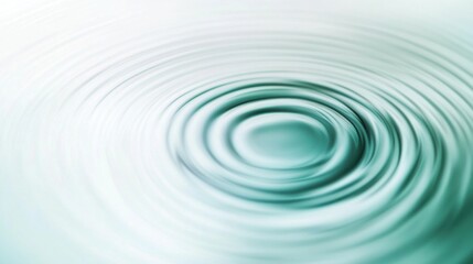 Abstract concentric teal water ripple circles.