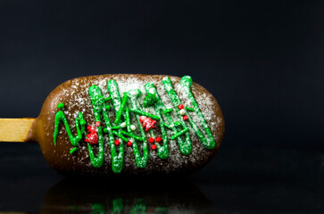 Tasty chocolate сake pops on black background.	