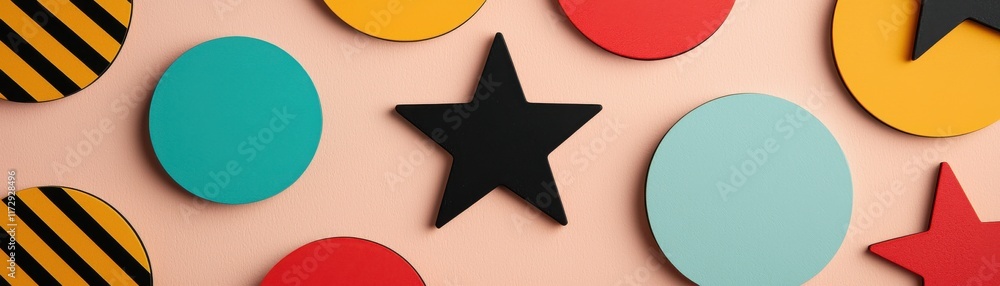 Aufkleber a vibrant arrangement of colorful geometric shapes, including circles and a star, set against a soft