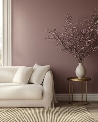 Cozy living room with mauve walls and linen sofa.