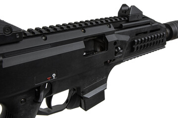 A modern black PCC (Pistol Caliber Carbine) with a suppressor, tactical rails, and adjustable...