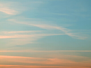 Gentle Cloud Lines in a Sunset Sky Evening