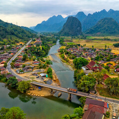 Fototapeta premium Road and village landscape of Nam Song River at Vang Vieng, Laos