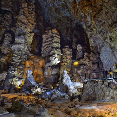 Kong Lor Cave in Phu Hin Bun National Park, Laos- Khammouane Province, Laos. Boat rafting in...