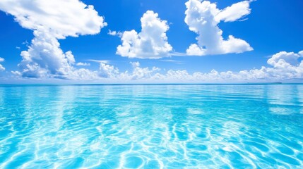 A panoramic view of a Maldives atoll with clear blue water and tiny islands scattered around.