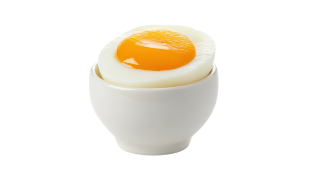 Soft Boiled Egg Served in a White Ceramic Egg Cup Ideal for Breakfast and Culinary Presentations.