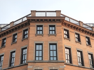 Fototapeta premium Modern Minimalist Building Exterior with White Facade and Windows