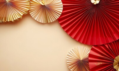 Decorative arrangement of red paper fans and cherry blossoms on a textured background
