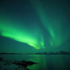 Naklejka premium Softly glowing aurora borealis in the night sky, greenish hue, misty