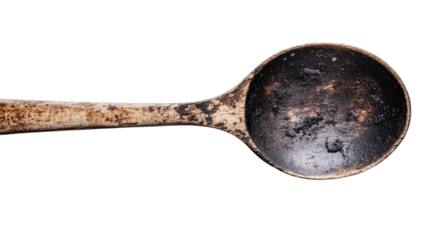 A Vintage Wooden Spoon with a Dark Stain Perfect for Rustic Kitchen Decor and Culinary Photography Projects.