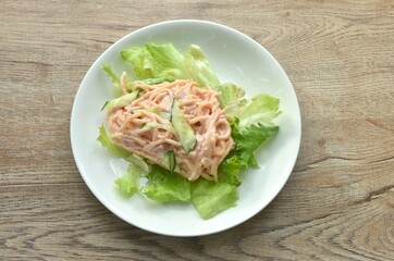 baking spaghetti slice ham pork with mashroom topping fish egg in mayonnaise cream sauce on plate   