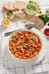 Pasulj, white bean soup with chicken in bowl