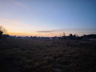 sunset over the city, Air pollution smoke from the chimney