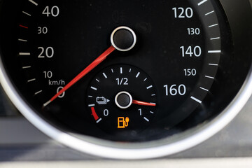 Charging indicator light on an older electric vehicle that indicates battery charging