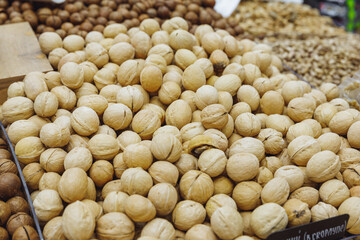 walnuts in shell, harvest season concept. Close-up view. High quality photo.